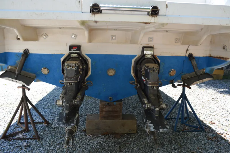 Slide: The Image of Rear view of a 2001 Monterey 282 Cruiser boat with dual outboard motors. - 1