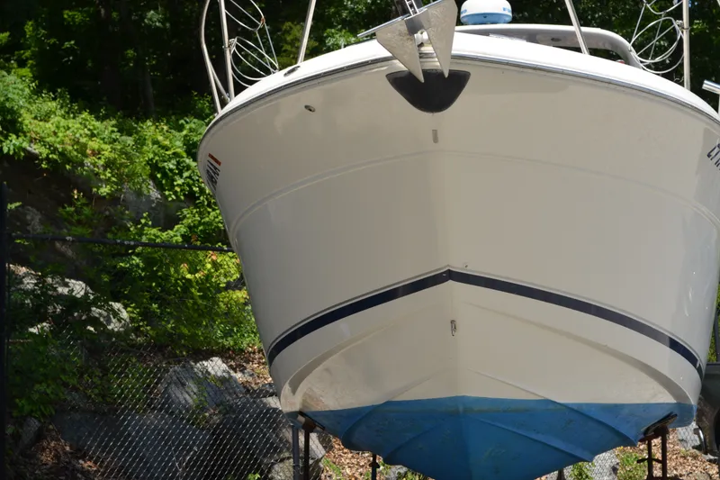 Slide: The Image of Front view of a 2001 Monterey 282 Cruiser boat on land. - 4