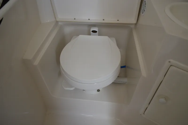 Slide: The Image of Toilet in 2001 Monterey 282 Cruiser boat bathroom. - 32
