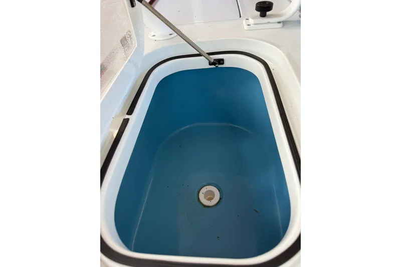 Slide: The Image of Open storage compartment in V-Tech 18 model boat, 2025 design. - 19