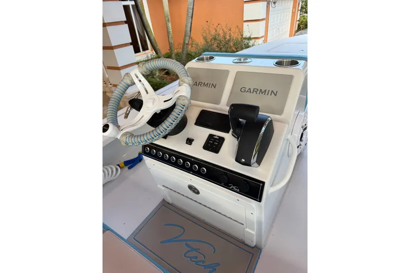 Slide: The Image of Steering console of 2025 V-Tech 18 boat with Garmin navigation system. - 6