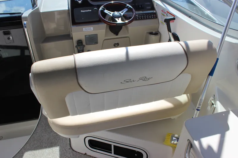 Slide: The Image of Captain's seat and helm of 2012 Sea Ray Sundancer 280 boat. - 12