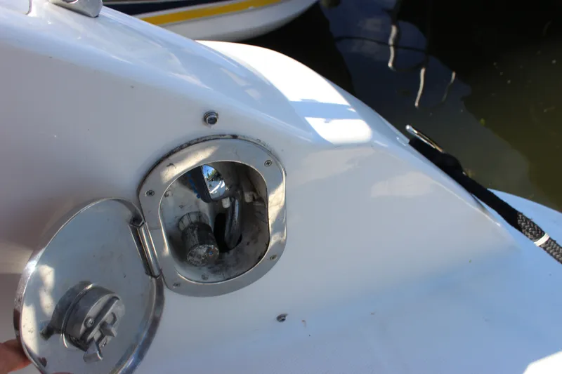 Slide: The Image of Fuel cap area of a 2012 Sea Ray Sundancer 280 boat. - 19
