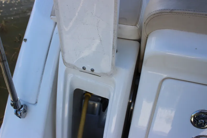 Slide: The Image of Close-up of 2012 Sea Ray Sundancer 280 boat deck with storage compartment. - 23