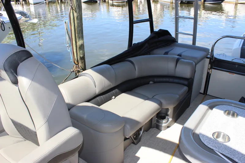 Slide: The Image of 2020 Avalon Catalina Platinum Cruise Funship interior with plush seating and cup holders. - 14