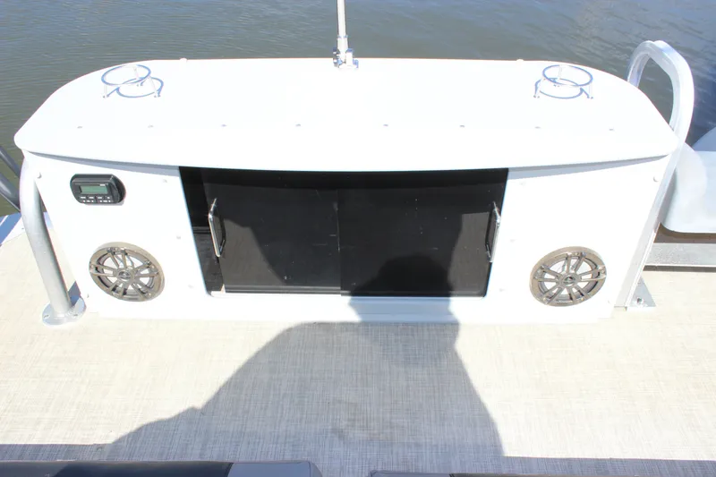 Slide: The Image of 2020 Avalon Catalina Platinum Cruise Funship deck with speakers and storage compartment. - 33