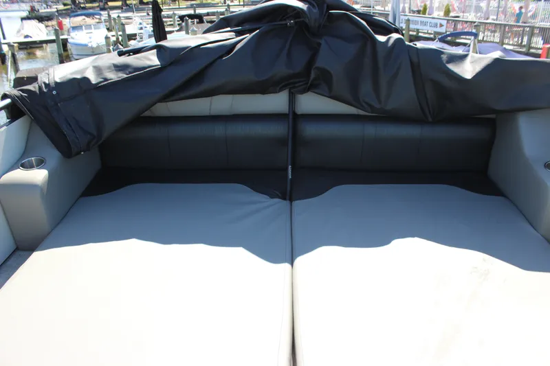 Slide: The Image of 2020 Avalon Catalina Platinum Cruise Funship interior with cushioned seating and cup holders. - 34