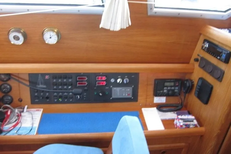 Slide: The Image of Control panel of a 2002 Nauticat 37 sailboat with navigation instruments. - 20