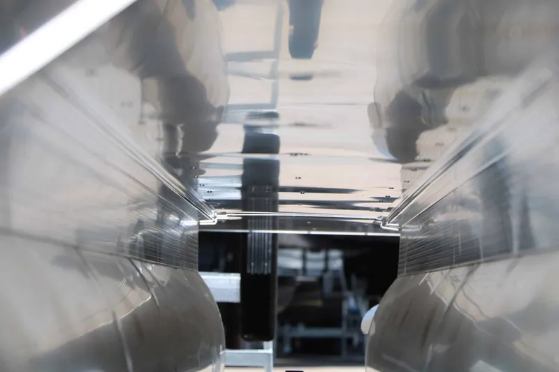 Slide: The Image of Close-up of the hull underside of a 2027 Bennington 22 MSB Tri Toon. - 26