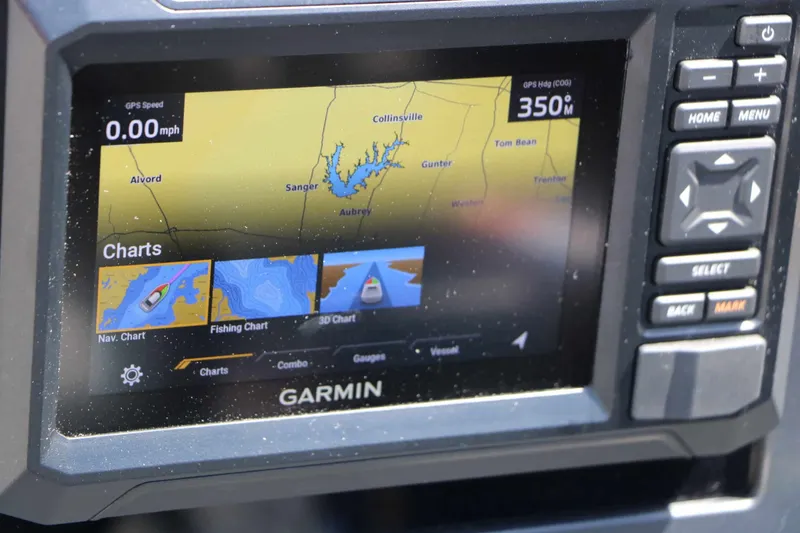 Slide: The Image of A Garmin navigation system displays a map with options like Nav. Chart and Fishing Chart. - 45