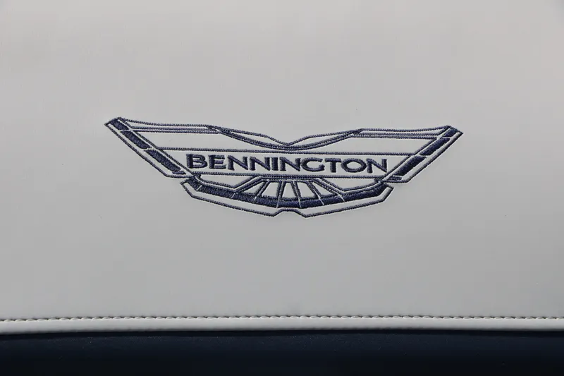 Slide: The Image of The image shows the embroidered Bennington logo on a seat cushion. - 32