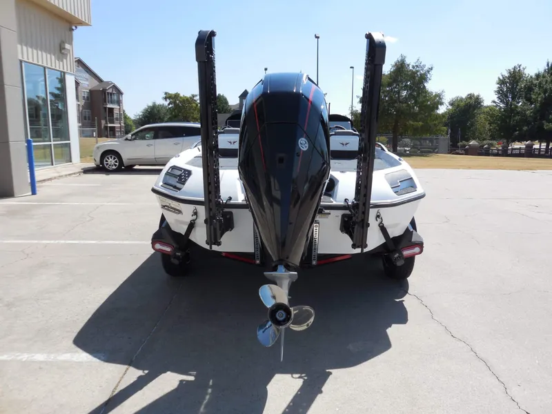 Slide: The Image of The image shows the rear of a 2027 Vexus VXs21 boat with an outboard motor. - 4