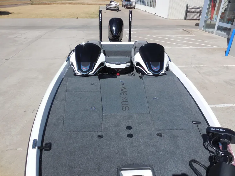 Slide: The Image of The image shows a 2027 Vexus VXs21 boat with a gray deck and two engines. - 18