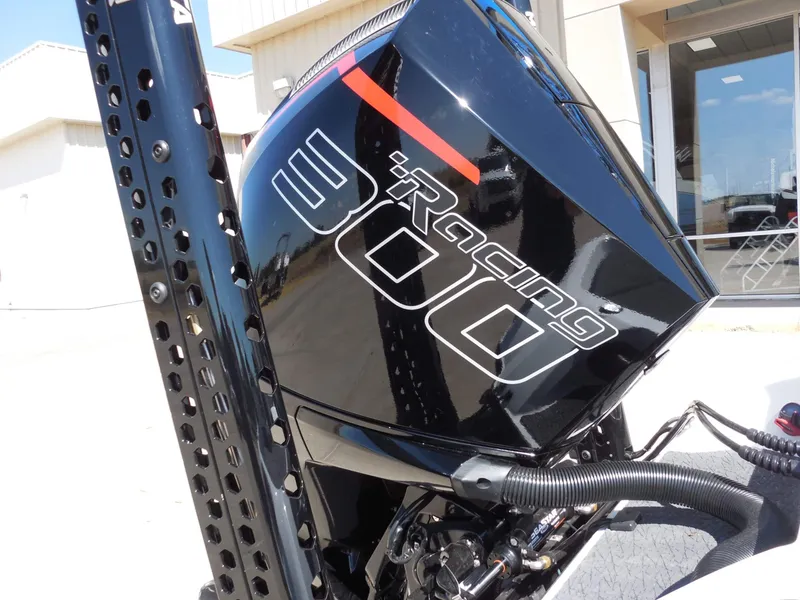 Slide: The Image of Close-up of a powerful outboard motor labeled "Racing 300." - 11