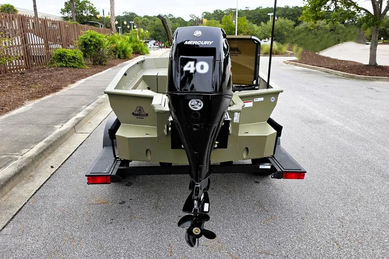 Slide: The Image of 2027 Tracker Grizzly 1553 Timber boat with Mercury 40 outboard motor on trailer. - 48