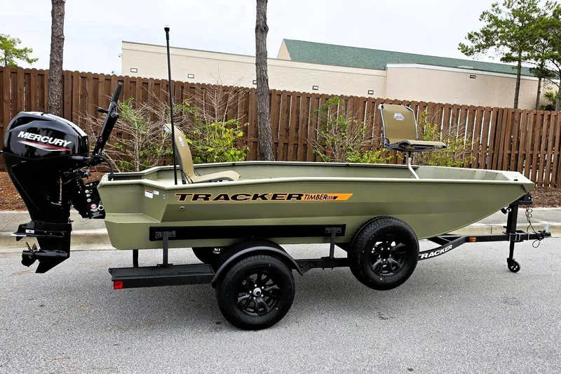 The Image of 2027 Tracker Grizzly 1553 Timber boat on trailer with Mercury outboard motor. - 0