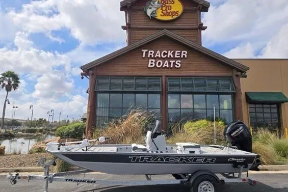 The Image of 2027 Tracker Bass Tracker Classic CC boat displayed outside Tracker Boats store. - 0