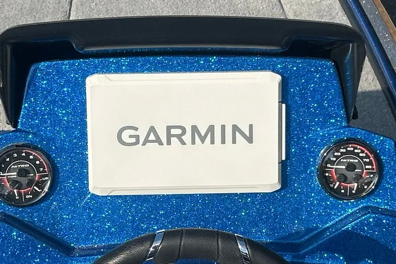 Slide: The Image of Dashboard of 2027 Nitro Z18 XL Pro with Garmin display and gauges. - 2