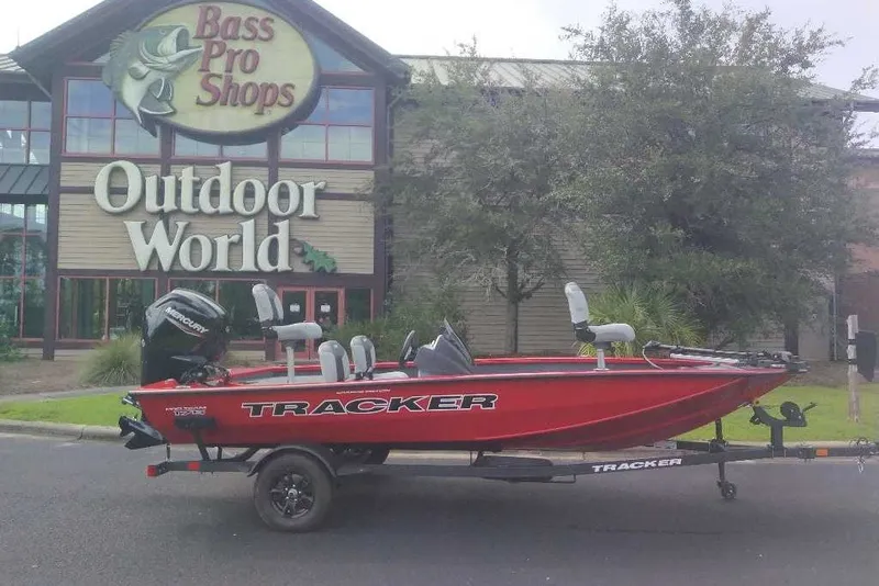 The Image of Red 2027 Tracker Pro Team 175 Crappie Edition boat outside Bass Pro Shops. - 0