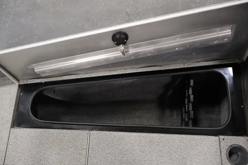 Slide: The Image of 2019 Tracker Pro Team 175 TXW boat storage compartment with key lock. - 18