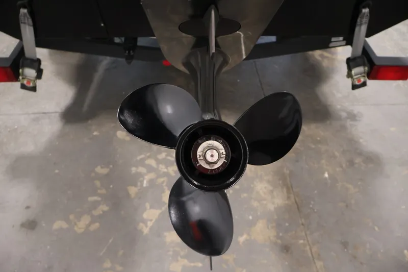Slide: The Image of 2019 Tracker Pro Team 175 TXW boat propeller in a garage setting. - 46