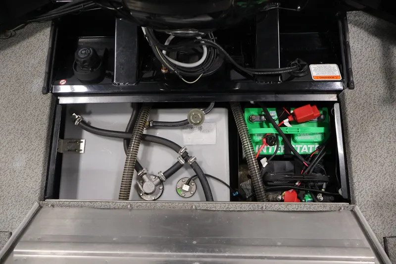 Slide: The Image of 2019 Tracker Pro Team 175 TXW boat battery compartment with wiring and components. - 40