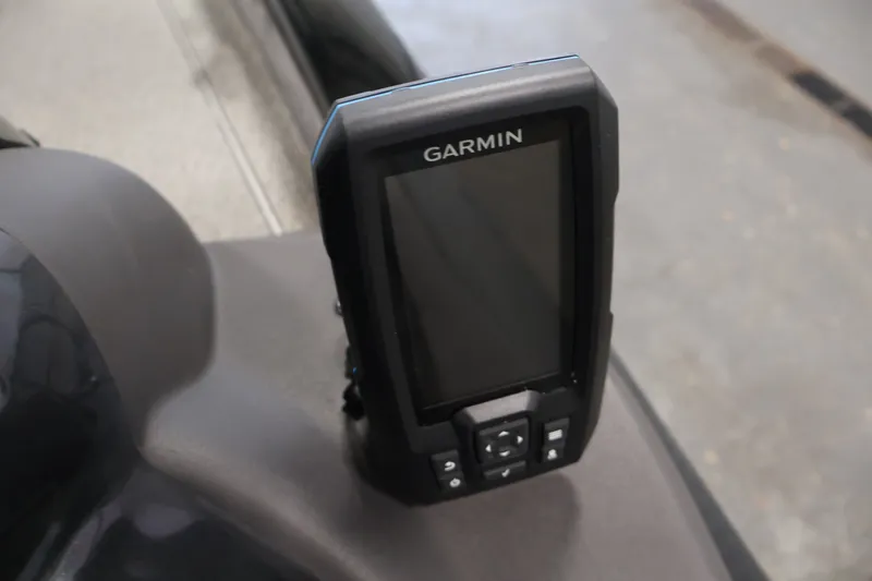 Slide: The Image of Garmin device mounted on 2019 Tracker Pro Team 175 TXW boat dashboard. - 31