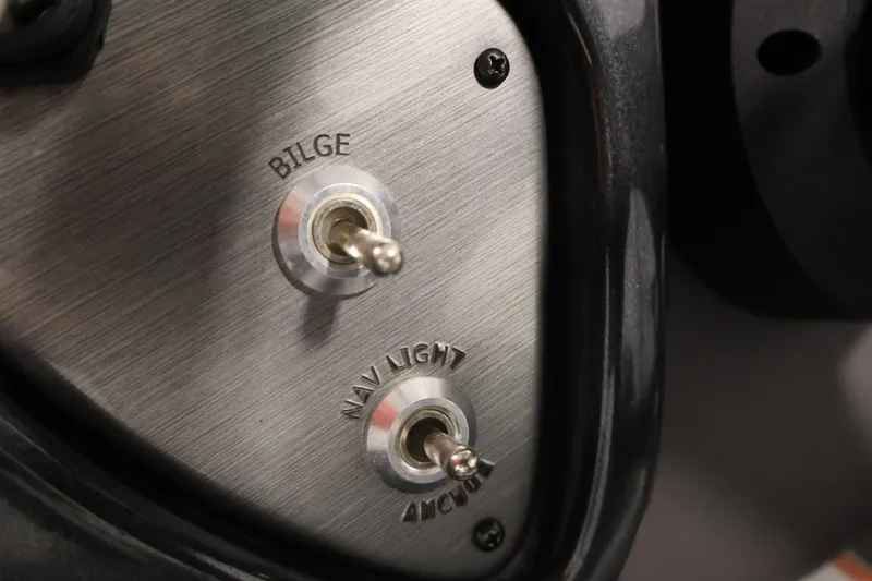 Slide: The Image of 2019 Tracker Pro Team 175 TXW boat switches for bilge and navigation lights. - 29