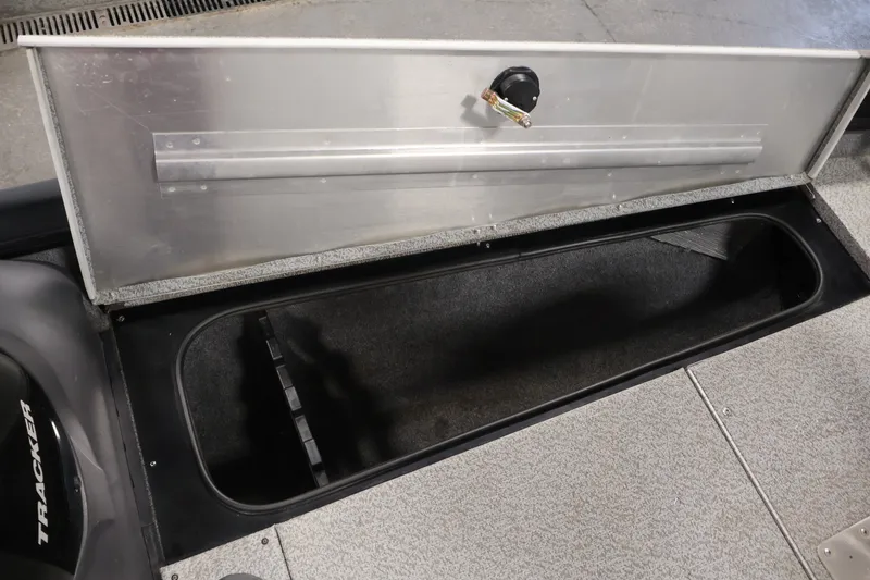 Slide: The Image of Open storage compartment in 2019 Tracker Pro Team 175 TXW boat. - 16