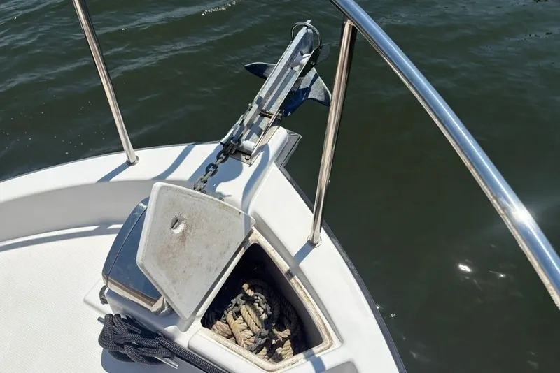 Slide: The Image of Bow of 2017 Ranger Tugs R-27 with anchor and rope storage. - 23