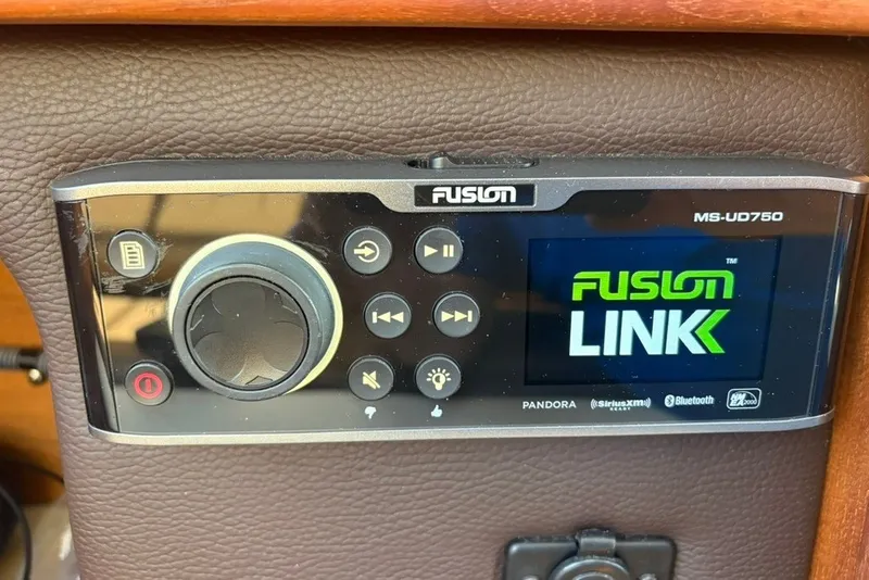 Slide: The Image of Fusion MS-UD750 audio system in 2017 Ranger Tugs R-27 boat dashboard. - 72