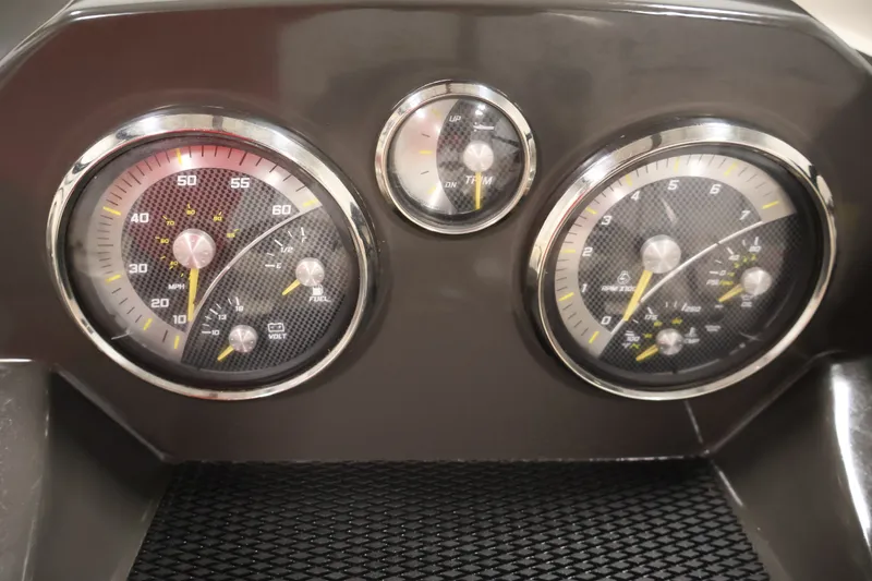 Slide: The Image of Dashboard of 2020 Bayliner VR4 Bowrider I/O with speedometer and gauges. - 21