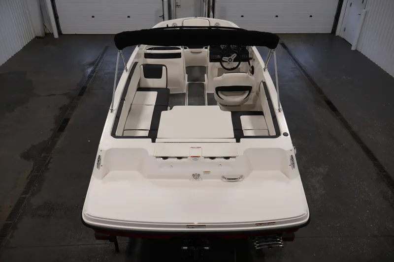 Slide: The Image of 2020 Bayliner VR4 Bowrider I/O boat interior, featuring spacious seating and sleek design. - 10