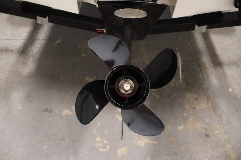 Slide: The Image of 2020 Bayliner VR4 Bowrider I/O propeller on a concrete floor. - 45