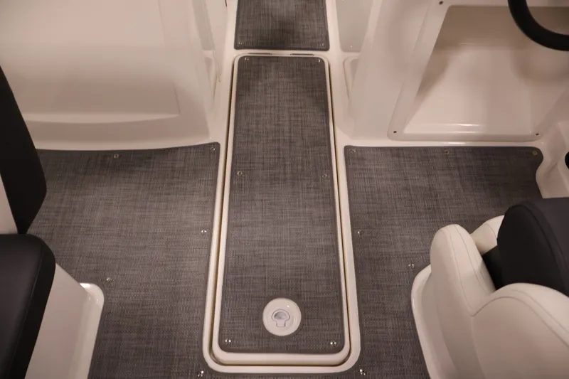 Slide: The Image of 2020 Bayliner VR4 Bowrider I/O interior with gray flooring and white seating. - 31