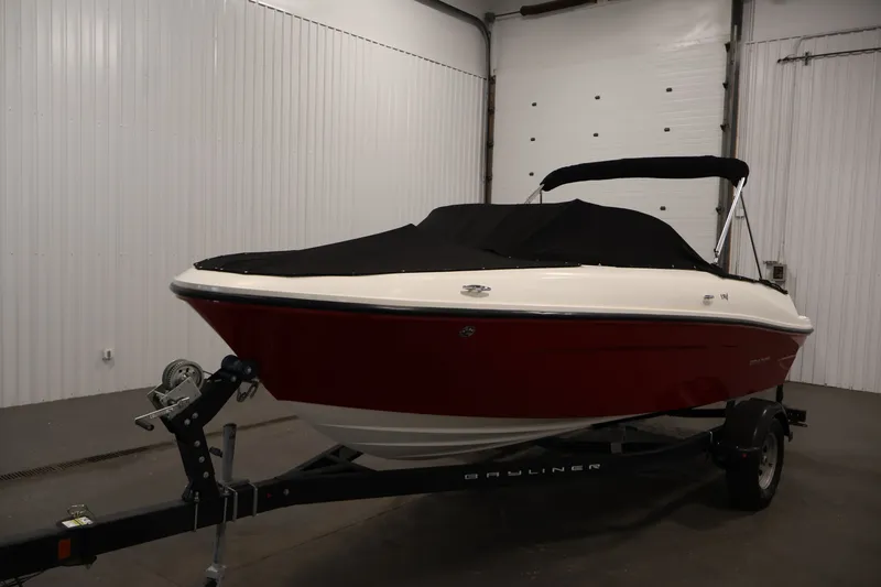Slide: The Image of 2020 Bayliner VR4 Bowrider I/O in a garage, covered and on a trailer. - 49