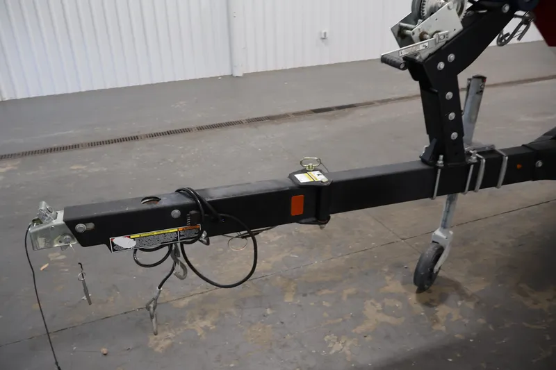 Slide: The Image of Trailer hitch of a 2020 Bayliner VR4 Bowrider I/O in a garage setting. - 46