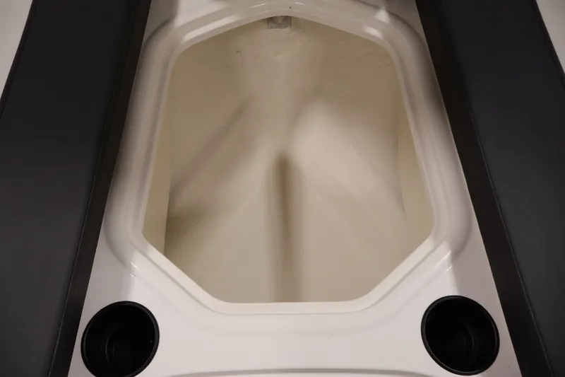Slide: The Image of 2020 Bayliner VR4 Bowrider I/O storage compartment with cup holders. - 12