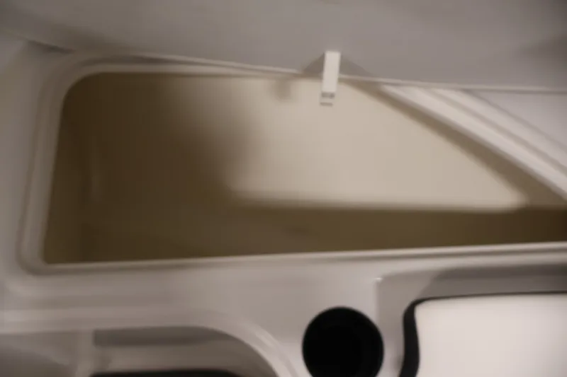 Slide: The Image of Storage compartment in a 2020 Bayliner VR4 Bowrider I/O boat. - 14