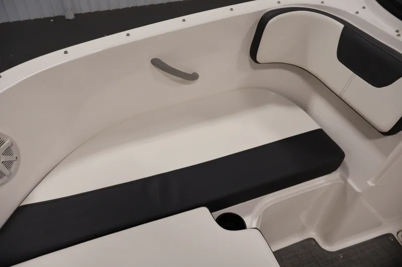 Slide: The Image of 2020 Bayliner VR4 Bowrider I/O interior seating with black and white upholstery. - 15