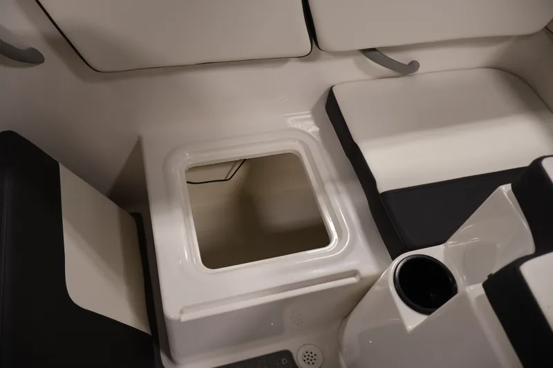 Slide: The Image of 2020 Bayliner VR4 Bowrider I/O interior storage compartment with seating and cup holder. - 39