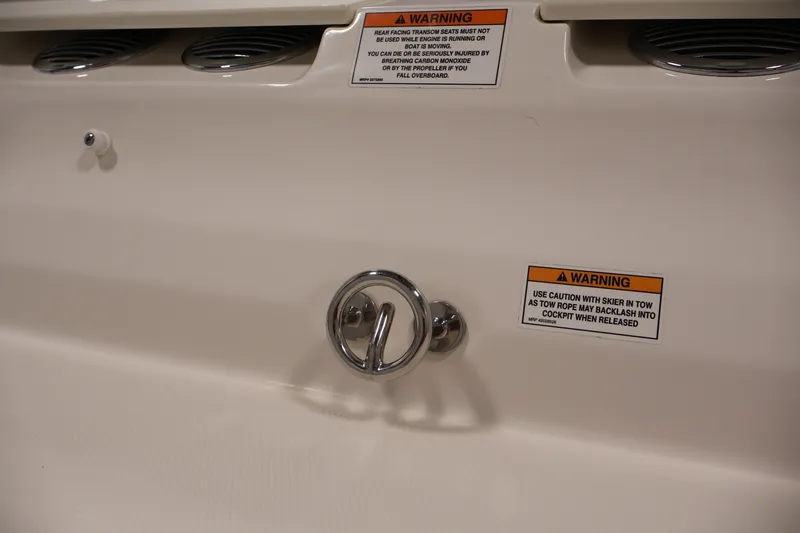 Slide: The Image of 2020 Bayliner VR4 Bowrider I/O boat stern with warning labels and tow hook. - 42
