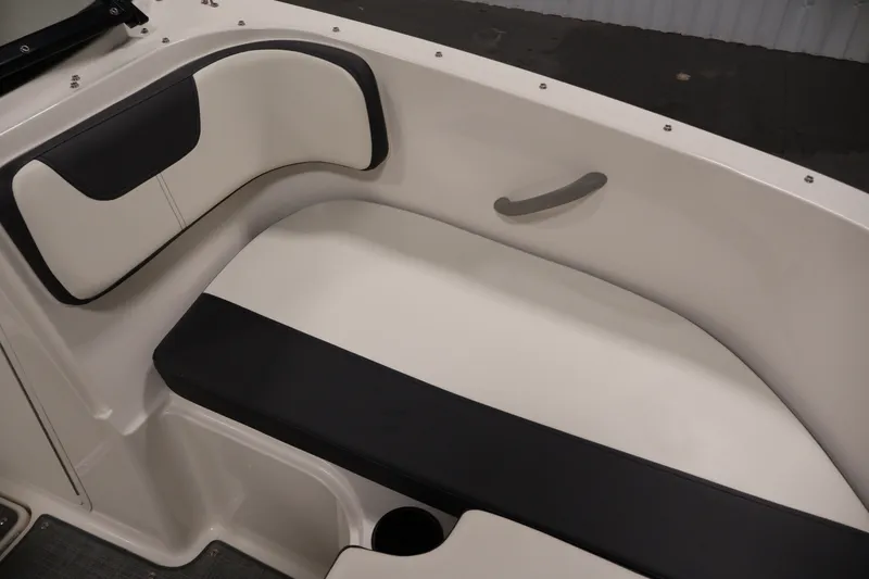 Slide: The Image of 2020 Bayliner VR4 Bowrider I/O interior seating with black and white upholstery. - 13