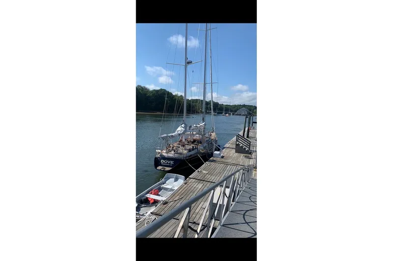 Slide: The Image of Sailboat docked on a sunny day, Ta Shing Skye 54, 1984 model. - 9