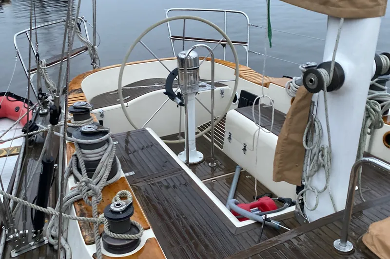 Slide: The Image of Cockpit of 1984 Ta Shing Skye 54 sailboat with steering wheel and winches. - 2