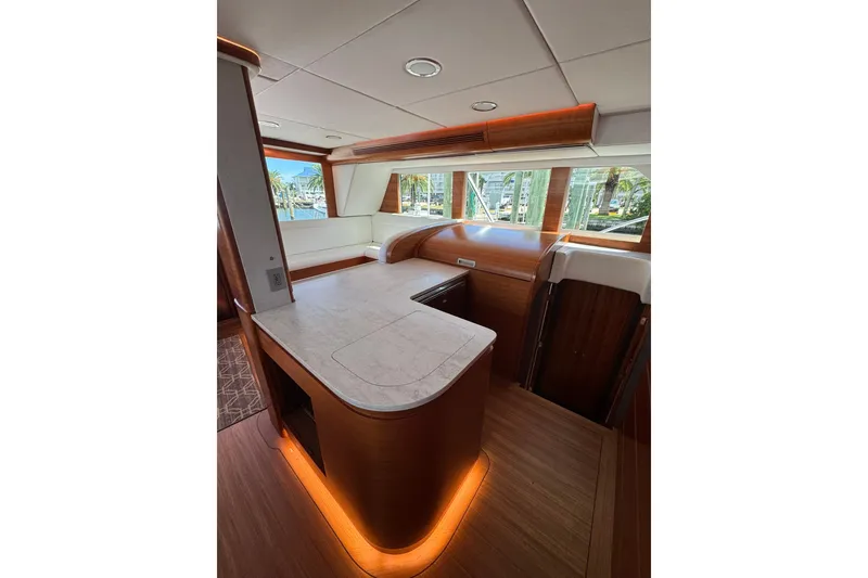 Slide: The Image of Luxurious interior of a 2001 Southern Composite Sportfish yacht with elegant wood finishes. - 14