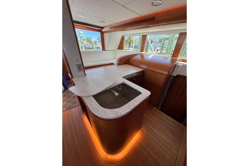 Slide: The Image of Luxurious interior of 2001 Southern Composite Sportfish yacht with modern kitchen design. - 15