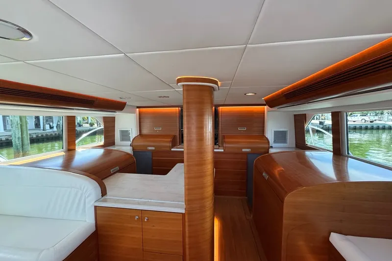 Slide: The Image of Luxurious interior of a 2001 Southern Composite Sportfish boat with elegant wood finishes. - 13