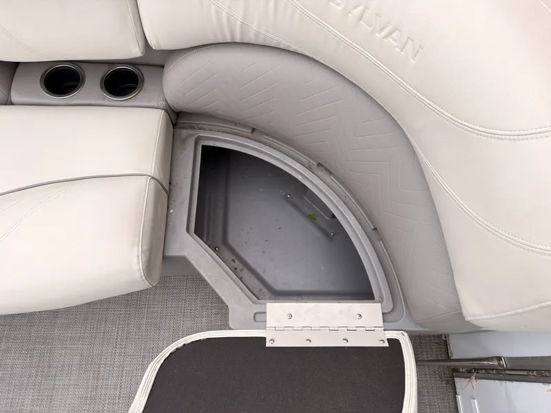 Slide: The Image of The image shows a boat seat with integrated storage and cup holders. - 16