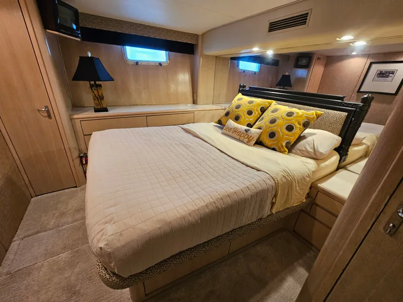 Slide: The Image of The image shows a cozy cabin with a large bed, decorative pillows, and wooden furnishings. - 3
